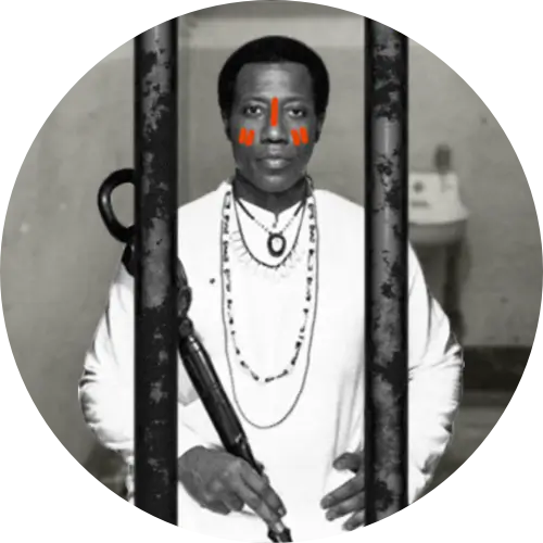 Image of Wesley Snipes, with Kwanzaa facepaint and Egyptian rod, in a jail cell for tax evasion